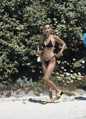 BELLA HADID in Bikini on the Set of a Photoshoot at a Beach 06/24/2020