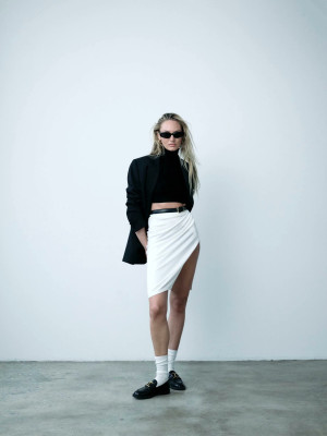 Candice Swanepoel for Tropic of C eco dressing collection