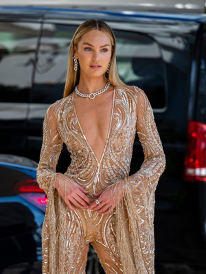 Candice Swanepoel - Arrives at the Cannes Film Festival | July 6, 2021