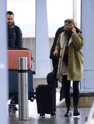 Cara Delevingne – Catches a Flight out of the UK