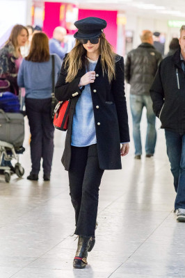 Dakota Johnson Spotted at Heathrow Airport 12/14/2017