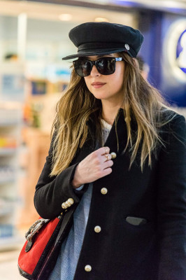 Dakota Johnson Spotted at Heathrow Airport 12/14/2017