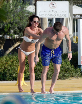 Danielle Lloyd in White Bikini on the pool in Dubai
