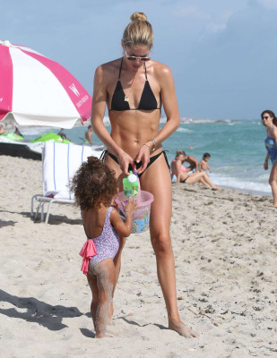  Doutzen Kroes in Black Bikini at the beach in Miami