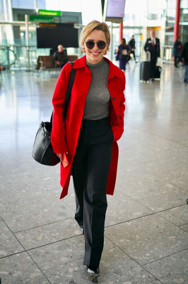Emilia Clarke in Travel Outfit – Heathrow Airport in London 02/21/2019