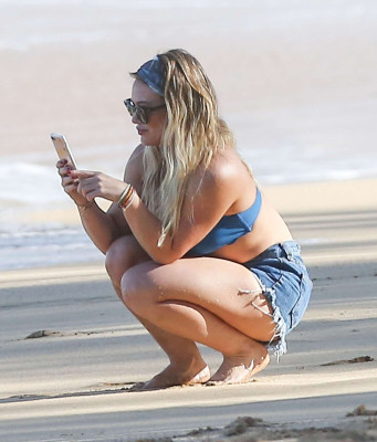 Hilary Duff in Bikini Top and Shorts in Hawaii