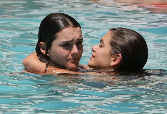 Kaia Gerber in Red Bikini at the pool in Miami