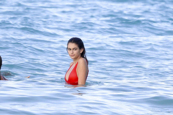 Kaia Gerber in Red Swimsuit at the Beach in St. Barts 4/8/2017
