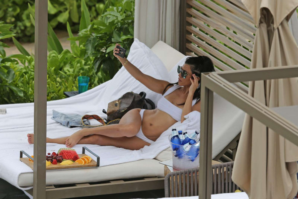 Kourtney Kardashian in White Bikini at a pool in Hawaii