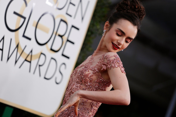 Lily Collins – 74th Annual Golden Globe Awards in Beverly Hills