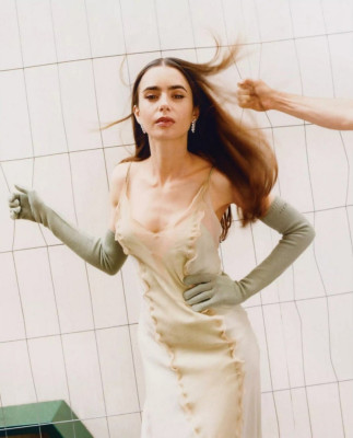 Lily Collins by Maciek Pozoga for Vogue France (Dec/Jan 2023)