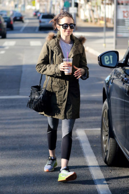 Lily Collins– Wearing a thick coat after leaving the gym in LA