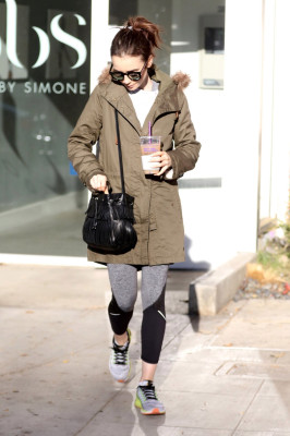 Lily Collins– Wearing a thick coat after leaving the gym in LA