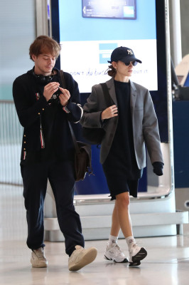 Natalia Dyer and Charlie Heaton Arrive at CDG Airport in Paris 09/23/2019