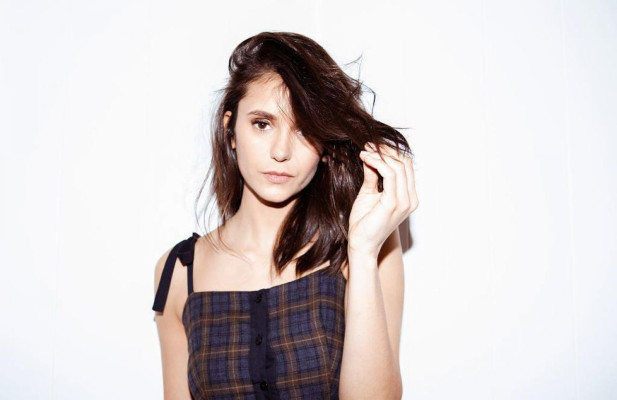 Nina Dobrev – Photoshoot for WWD March 2019
