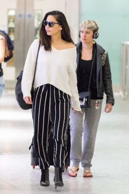 Olivia Munn at Heathrow Airport in London
