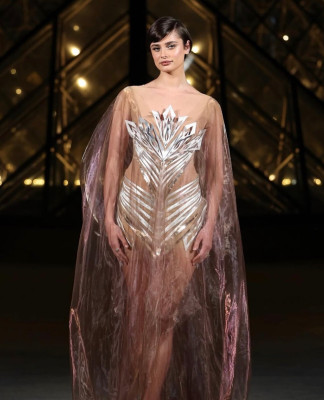 Taylor Hill at Le Grand Dinner Du Louvre Paris March 2025